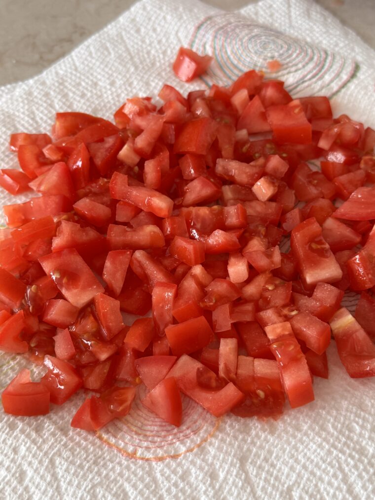 drain the tomatoes on paper towels