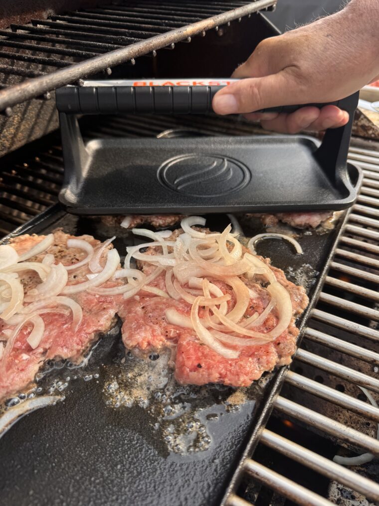 Flip and smash the onion burger.